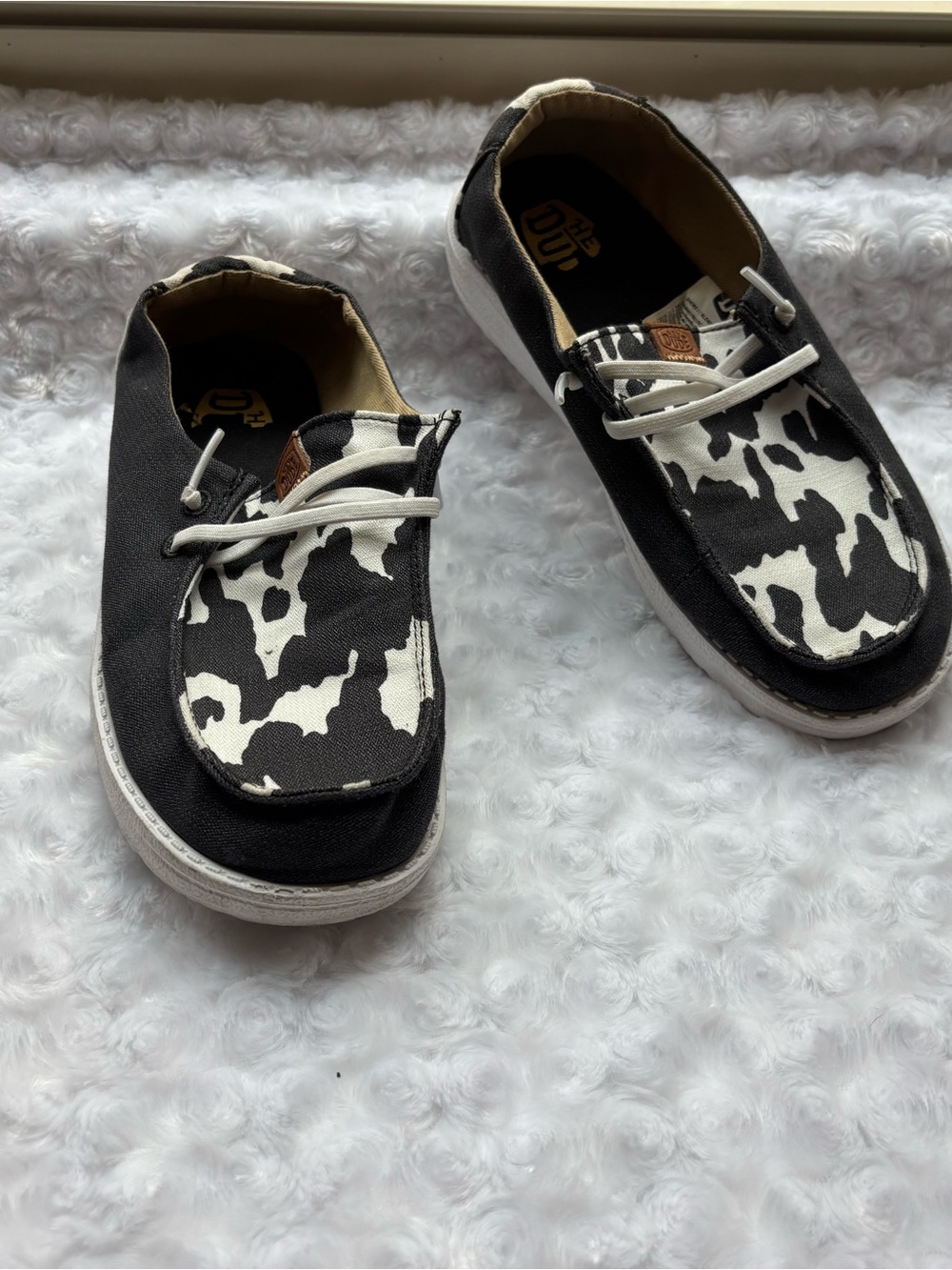 Hey Dude Kids Black and White Cow Print Sneakers
